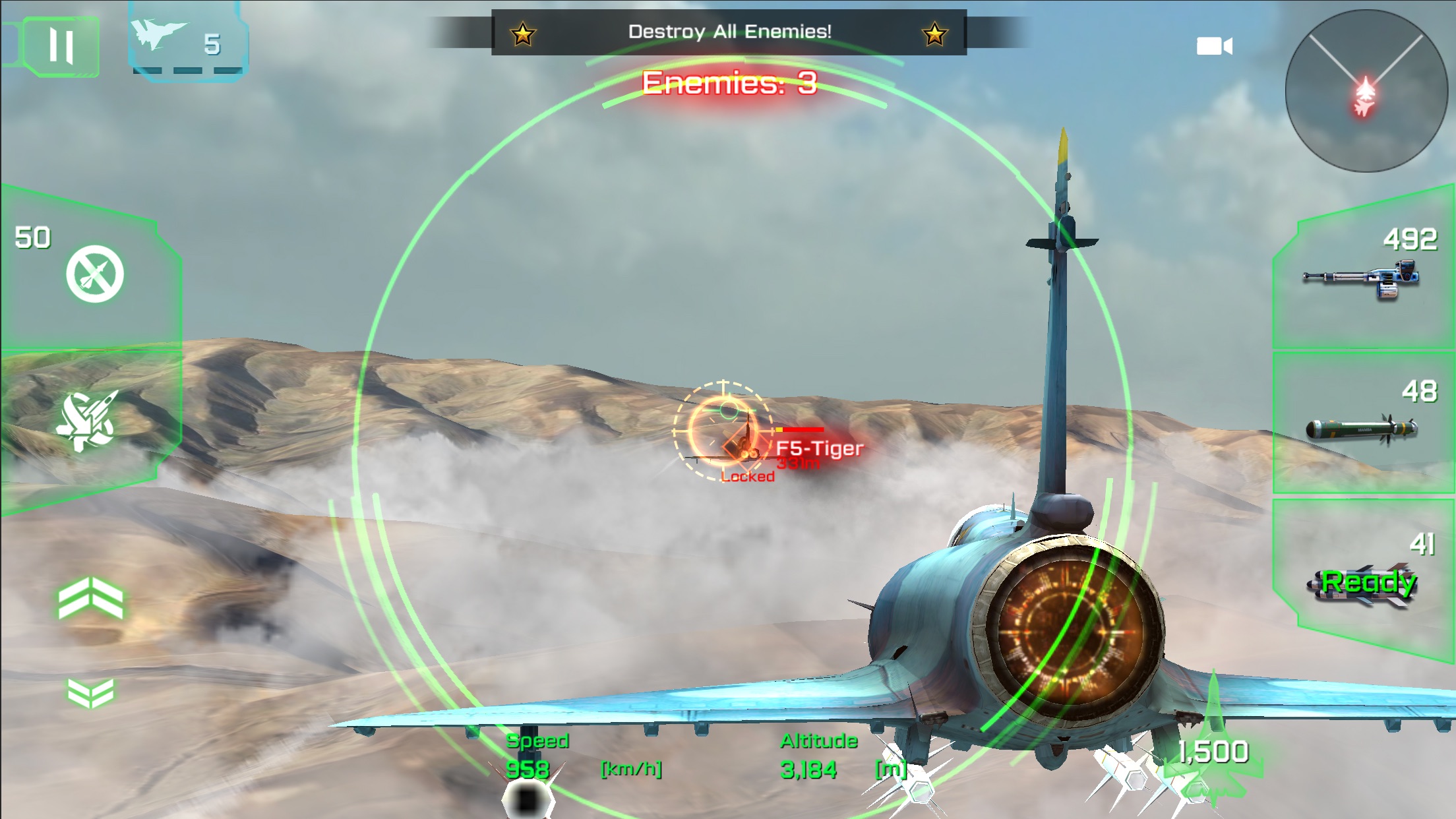 iPhone chase still with a lock on an F5-Tiger above desert terrain